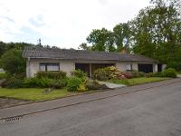 Wohnimmobilie Kauf Einfamilienhaus Großzügiger Winkel-Bungalow in ruhiger Waldrandlage