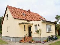 Wohnimmobilie Kauf Einfamilienhaus Einfamilienhaus in Boock mit 2h Land. Das Haus wurde im Jahr 1912 gebaut. Im Erdgeschoss (Raumhöhe 2,95 m) befinden sich ein Wohnzimmer mit Kamin, eine Stube, ein Sc