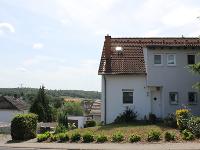 Wohnimmobilie Kauf Doppelhaus Gemütliche Doppelhaushälfte mit Balkon und Terrasse