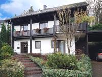 Wohnimmobilie Kauf Einfamilienhaus Hier wird sich Ihre Familie wohlfühlen! Charmantes Einfamilienhaus mit Apartment in Waldrandlage