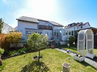 Wohnimmobilie Kauf Einfamilienhaus Ein Paradies für die ganze Familie - Einfamilienhaus mit großzügigem Garten!