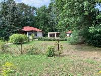 Wohnimmobilie Kauf Einfamilienhaus Wohnbungalow auf naturnah gestaltetem Grundstück - unweit des Bötzsees