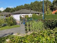 Wohnimmobilie Kauf Einfamilienhaus Winkelbungalow mit Gartenidylle in gute Hände abzugeben