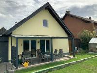 Wohnimmobilie Kauf Einfamilienhaus Schönes freistehendes Einfamilienhaus mit Garten & Carport - VERKAUFT