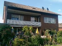 Wohnimmobilie Kauf Mehrfamilienhaus Mehrfamilienhaus in Hopsten mit 3 vermieteten Wohnungen, Garten und Balkon als Kapitalanlage