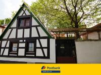 Wohnimmobilie Kauf Einfamilienhaus Fachwerkperle mit urigem Hof mitten in Frankfurt!