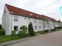 Wohnimmobilie Kauf Mehrfamilienhaus Geförderte Wohnanlage mit 7 Reihenhäusern und Garagen in Neersen
