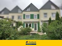 Wohnimmobilie Kauf Reihenhaus FAMILIEN WILLKOMMEN - VIEL PLATZ FÜR SIE UND IHRE LIEBSTEN - Reihenmittelhaus in Split-Level-Bauweise mit Garage und Garten