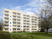 Wohnimmobilie Kauf Etagenwohnung Schön geschnittene Dreiraumwohnung mit EBK und Balkon