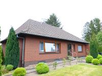 Wohnimmobilie Kauf Einfamilienhaus Bungalow mit Vollkeller auf großem Grundstück
