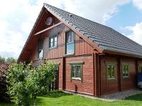 Wohnimmobilie Kauf Einfamilienhaus Holzhaus - Massiv mit natürlichem Wohlfühlkli