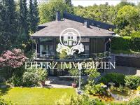 Wohnimmobilie Kauf Einfamilienhaus Spektakuläre Architektur mit atemberaubendem Panorama!