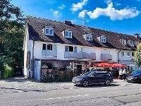 Gewerbeimmobilie Mehrfamilienhaus Solide vermietetes Wohnhaus mit Gewerbeeinheit(en)