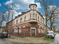 Wohnimmobilie Kauf Mehrfamilienhaus Renditehaus mit 11 Wohnungen und 2 Gewerbeeinheiten mit viel Potential - in begrünter Seitenstraße