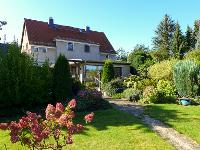 Wohnimmobilie Kauf Doppelhaus Gepflegtes, modernisierungsbedürftiges Haus in großem Garten