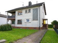 Wohnimmobilie Kauf Einfamilienhaus Attraktives Zweifamilienhaus mit großem Grundstück und herrlicher Weitsicht