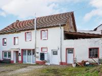 Wohnimmobilie Kauf Einfamilienhaus Charmantes Einfamilienhaus mit modernem Komfort und vielseitigem Nebengebäude