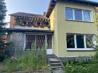 Wohnimmobilie Kauf Erdgeschosswohnung Wohnung mit schönem Garten nach hinten raus