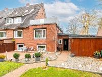 Wohnimmobilie Kauf Reihenhaus Modernisiertes Reihenendhaus mit Dachterrasse und sonnigem Garten