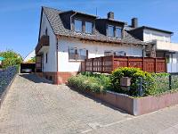 Wohnimmobilie Kauf Doppelhaus Großzügiges Zuhause in ruhiger Lage mit Garten, Garage und viel Potenzial: Dieses gepflegte Haus bietet Familien Raum zum Leben – und Freiraum zur individuellen Modernisi